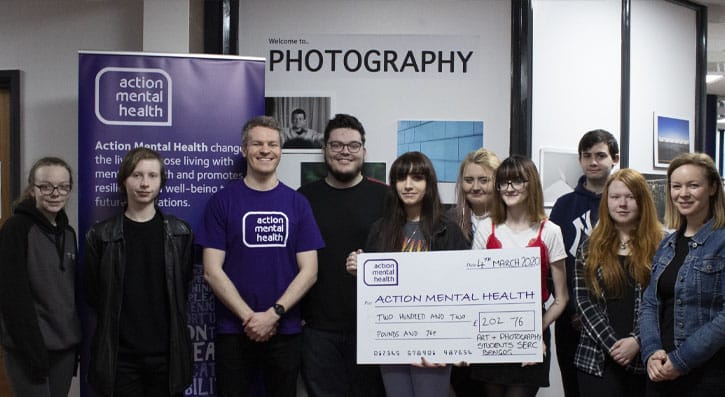 Art and Design students hand over cheque for £202 to Action Mental Health